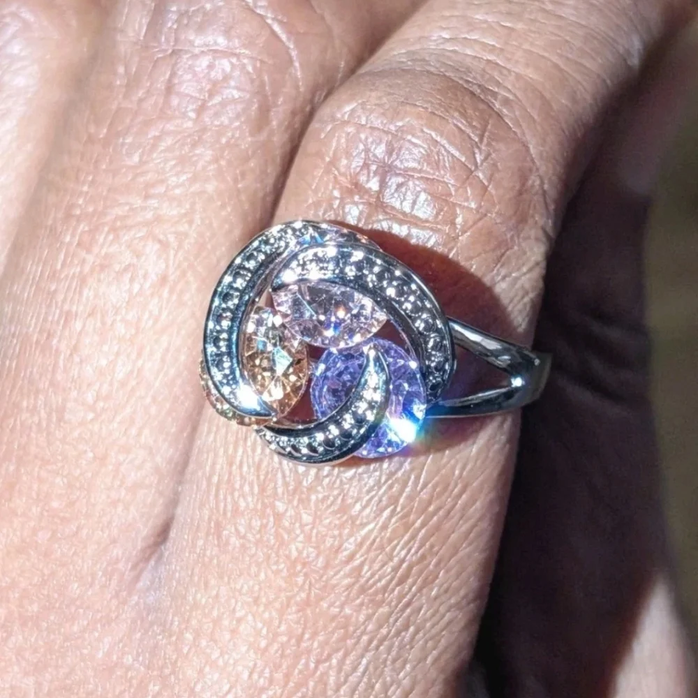 Sparkling Zirconia With Pink,yellow, and Purple Rotating Gemstone Design Sz 8